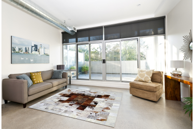 Salt and pepper brown cowhide rug