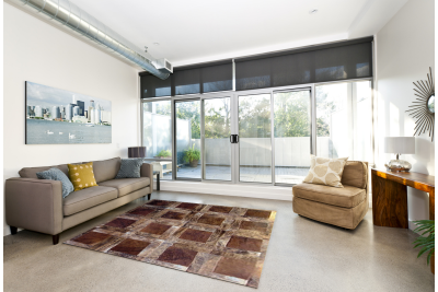 Brown brindle blocks cowhide rug