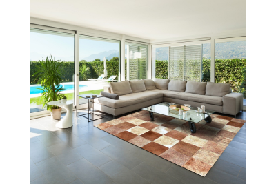 Brindle and beige cowhide rug