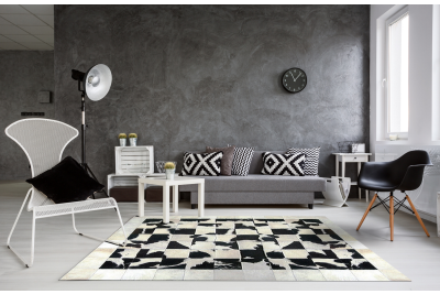 Radiant white and black cowhide rug
