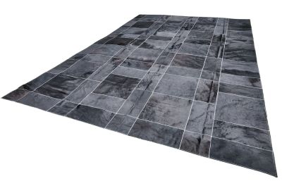Black cowhide rug with White stitching