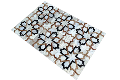 White, black and beige modern cowhide rug