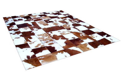 Brown and white cowhide rug