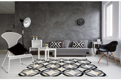 White, black and gray chain cowhide rug