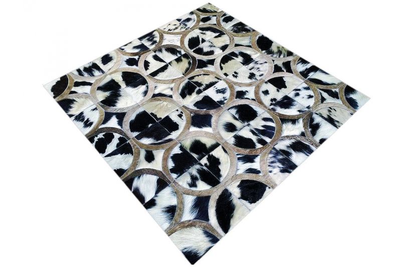 Black, white & taupe cowhide rug
