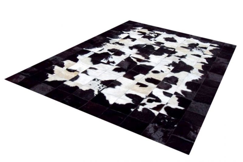Black and white cowhide rug