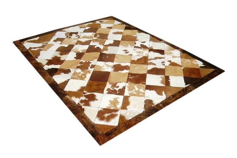 Brown and white rhombuses cowhide rug